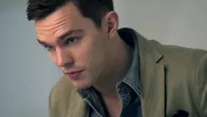 Nicholas Hoult Staring Upward Wallpaper