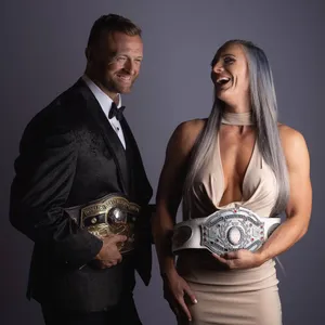 Nick Aldis And Kamille In Formal Attire Wallpaper