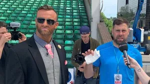 Nick Aldis Interview At Sports Event Wallpaper