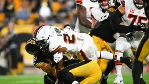 Nick Chubb Powerful Tackle Wallpaper