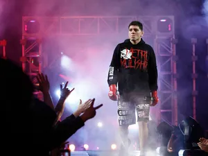 Nick Diaz Making His Marked Entrance In Mixed Martial Arts Wallpaper