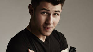 Nick Jonas Charming Portrait Wallpaper