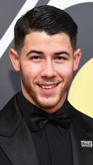 Nick Jonas Time's Up Pin Wallpaper