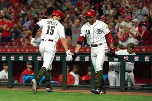 Nick Senzel Displaying His Skills On The Baseball Field Wallpaper