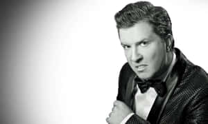 Nick Swardson - Dynamic Comedian In Action Wallpaper