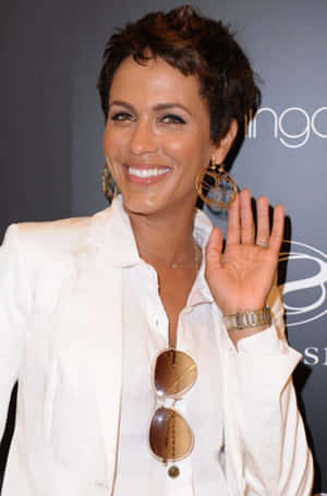 Nicole Ari Parker Smiling Radiantly In A Photoshoot Wallpaper