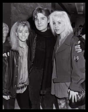 Nicole Eggert Posing Gracefully During A Photoshoot Wallpaper