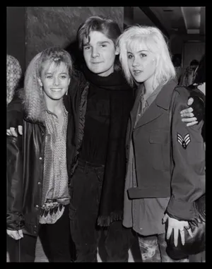 Nicole Eggert Posing Gracefully During A Photoshoot Wallpaper