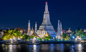 Night Photograph Of Wat Arun Wallpaper