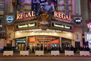 Night Time At Regal Cinema Building Wallpaper