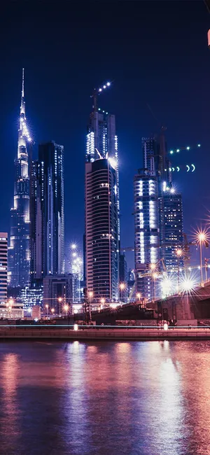 Night View Dubai City Iphone Low Angle Shot Wallpaper