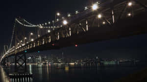 Nighttime Cityscape Bridge Illumination Wallpaper