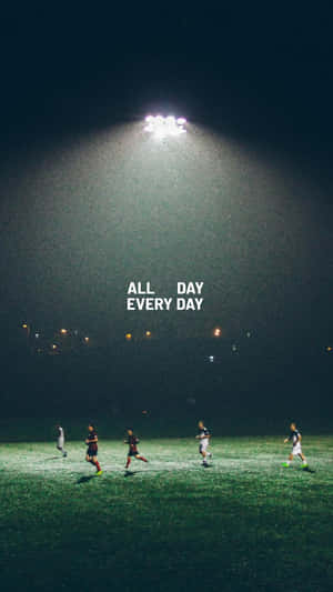 Nighttime Football Practice Motivation Wallpaper