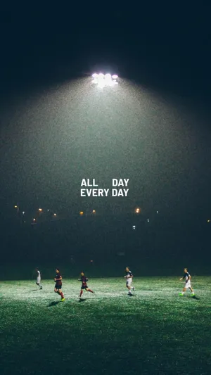 Nighttime Football Practice Motivation Wallpaper