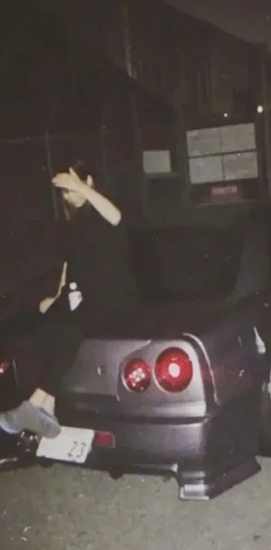 Nighttime_ J D M_ Car_and_ Person_ Pose.jpg Wallpaper