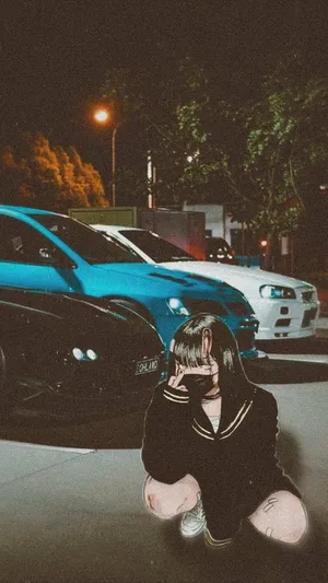 Nighttime J D M Car Meet Person Crouching Wallpaper