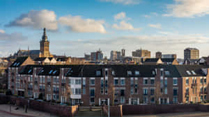 Nijmegen Cityscapewith Historic Tower Wallpaper