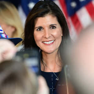 Nikki Haley Smiling: A Representative Of American Diplomacy Wallpaper