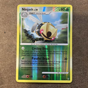 Ninjask Trading Card Brown Table Wallpaper