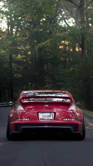 Nissan 350z: The Sleek, Stylish Sports Car For The Modern Driver Wallpaper