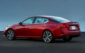 Nissan Altima: Sleek Design Meets Superior Performance Wallpaper