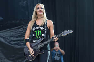 Nita Strauss Guitar Performance Wallpaper