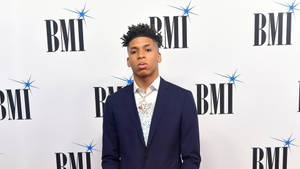 Nle Choppa Rocks A Blue Suit In Style Wallpaper