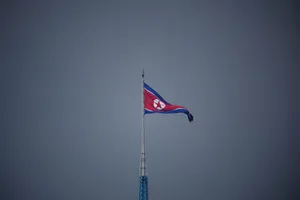 North Korea Flag On High Pole Wallpaper