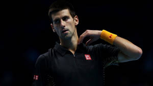 Novak Djokovic Black Jersey Closeup Wallpaper