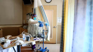 Nurse Inside Room With Hospital Bed Wallpaper