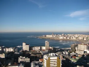 Ocean And Buildings Corunna Wallpaper