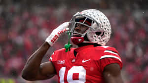 Ohio State Football Player Saluting Wallpaper