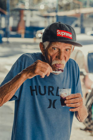 Old Man Eating Ice Cream Wallpaper