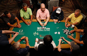 Old Men Playing In Poker Table Wallpaper