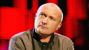 Old Phil Collins Creepy Stare Wallpaper