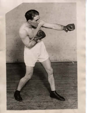 Old Photo Of Johnny Dundee Doing A Boxing Stance Wallpaper