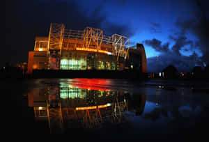 Old Trafford Stadium Night Reflection Wallpaper