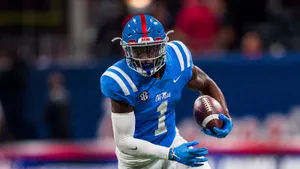 Ole Miss Football Player Action Shot Wallpaper