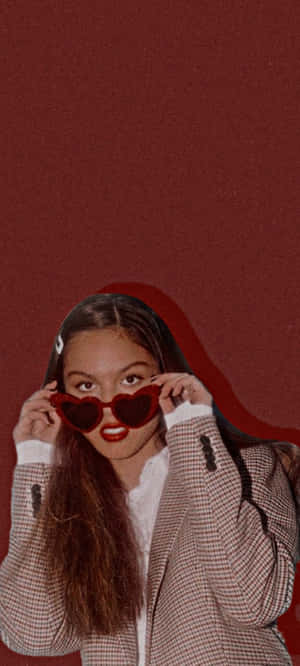 Olivia Rodrigo Radiating Love And Joy Wallpaper