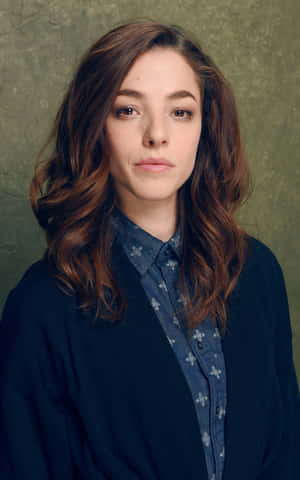 Olivia Thirlby Striking A Pose In A Stylish Outfit Wallpaper