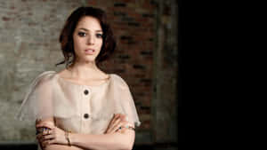 Olivia Thirlby Striking A Pose On A Rooftop Wallpaper