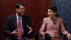 Olympia Snowe On Armchair Wallpaper