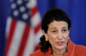 Olympia Snowe With Us Flag Wallpaper