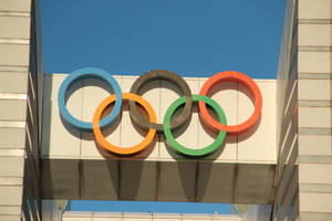 Olympic Signage Against Beautiful Sky Wallpaper