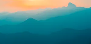 Ombre Teal Rocky Mountains Wallpaper