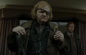 One Eyed Character Holding Figurine Wallpaper