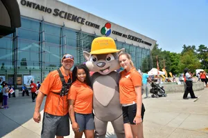 Ontario Science Centre Visitors With Mascot Wallpaper