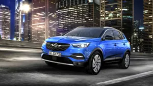 Opel Grandland X On A Dramatic Landscape Wallpaper