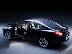 Opel Insignia Luxury Sedan On The Road Wallpaper