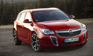 Opel Insignia Sporty Sedan In Captivating Scenery Wallpaper